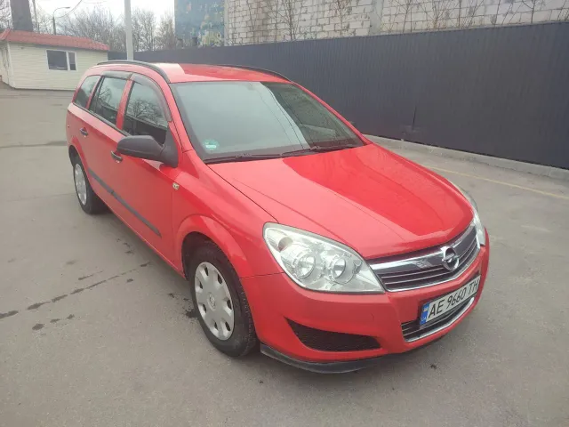 Opel Astra - фото 1