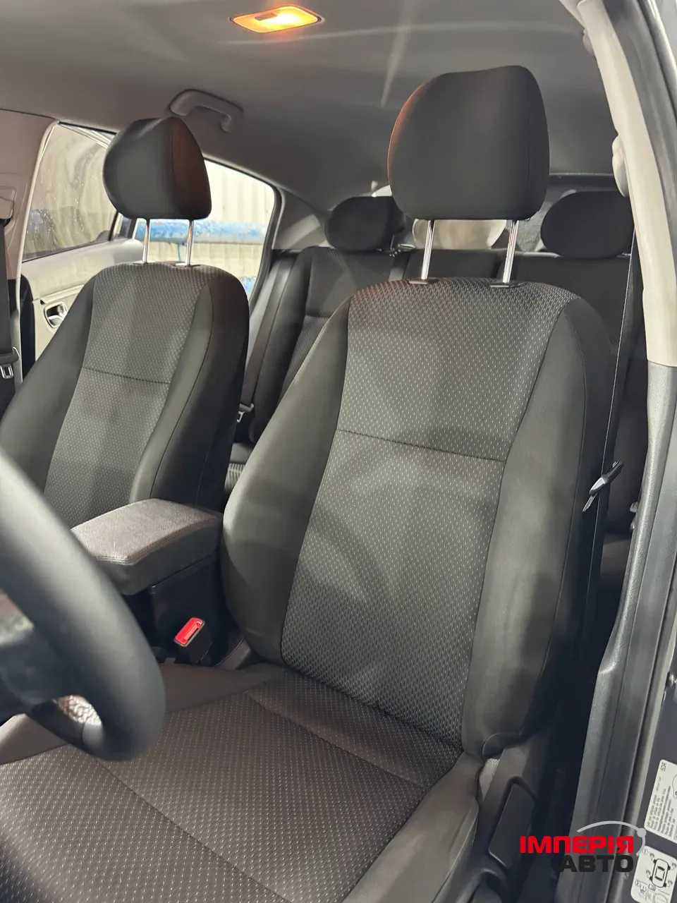 Kia Rio - фото 8