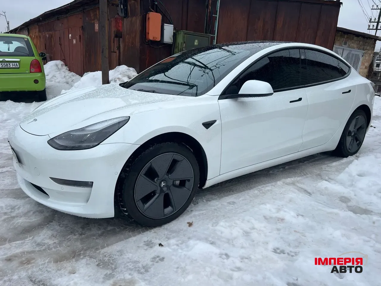 Tesla Model 3 - фото 1