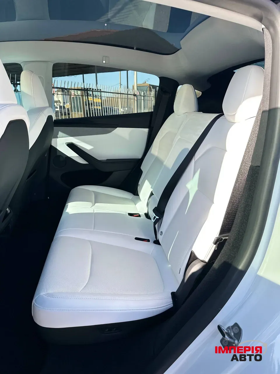 Tesla Model Y - фото 11