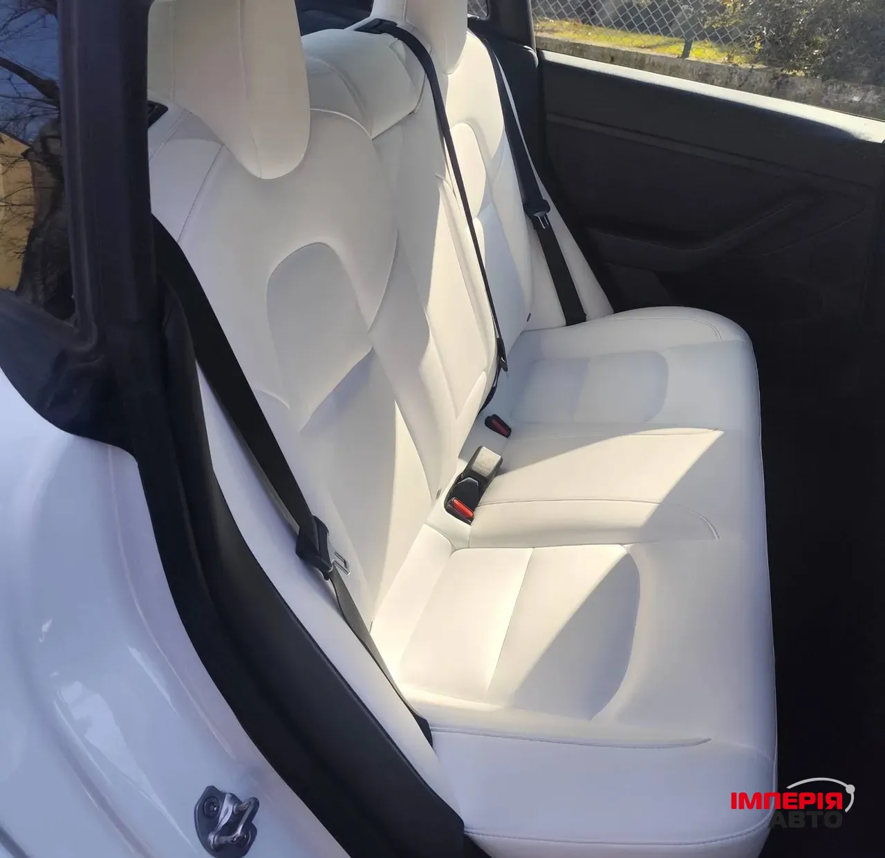 Tesla Model 3 - фото 8