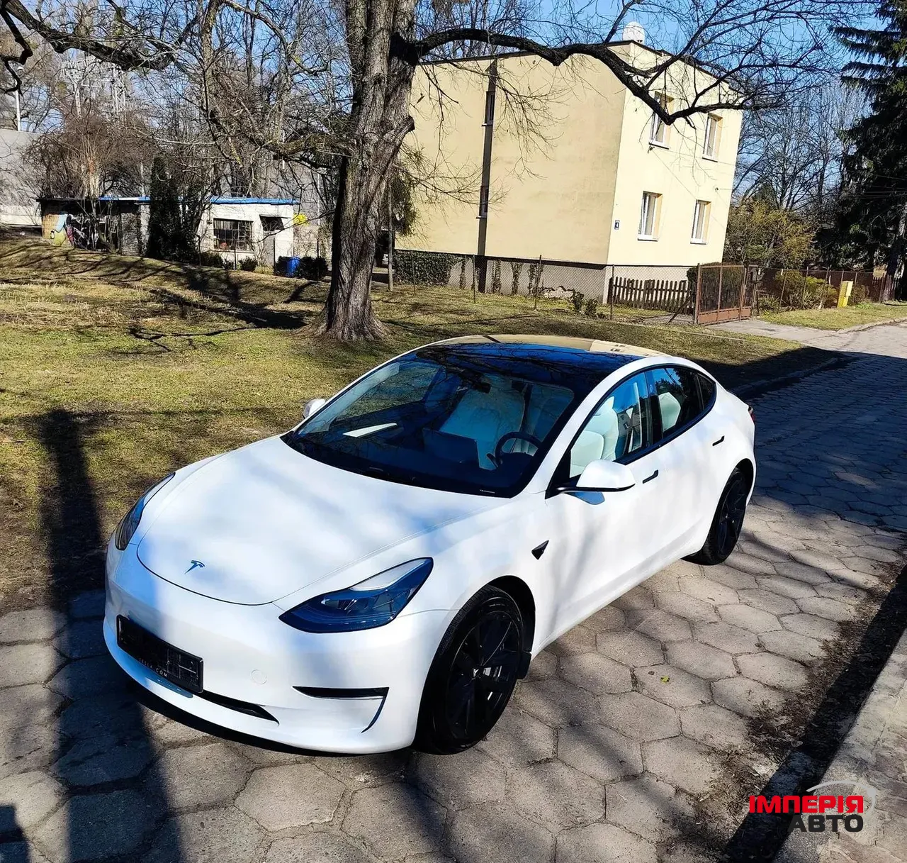 Tesla Model 3 - фото 1