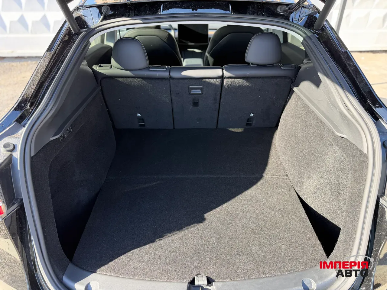 Tesla Model Y - фото 11