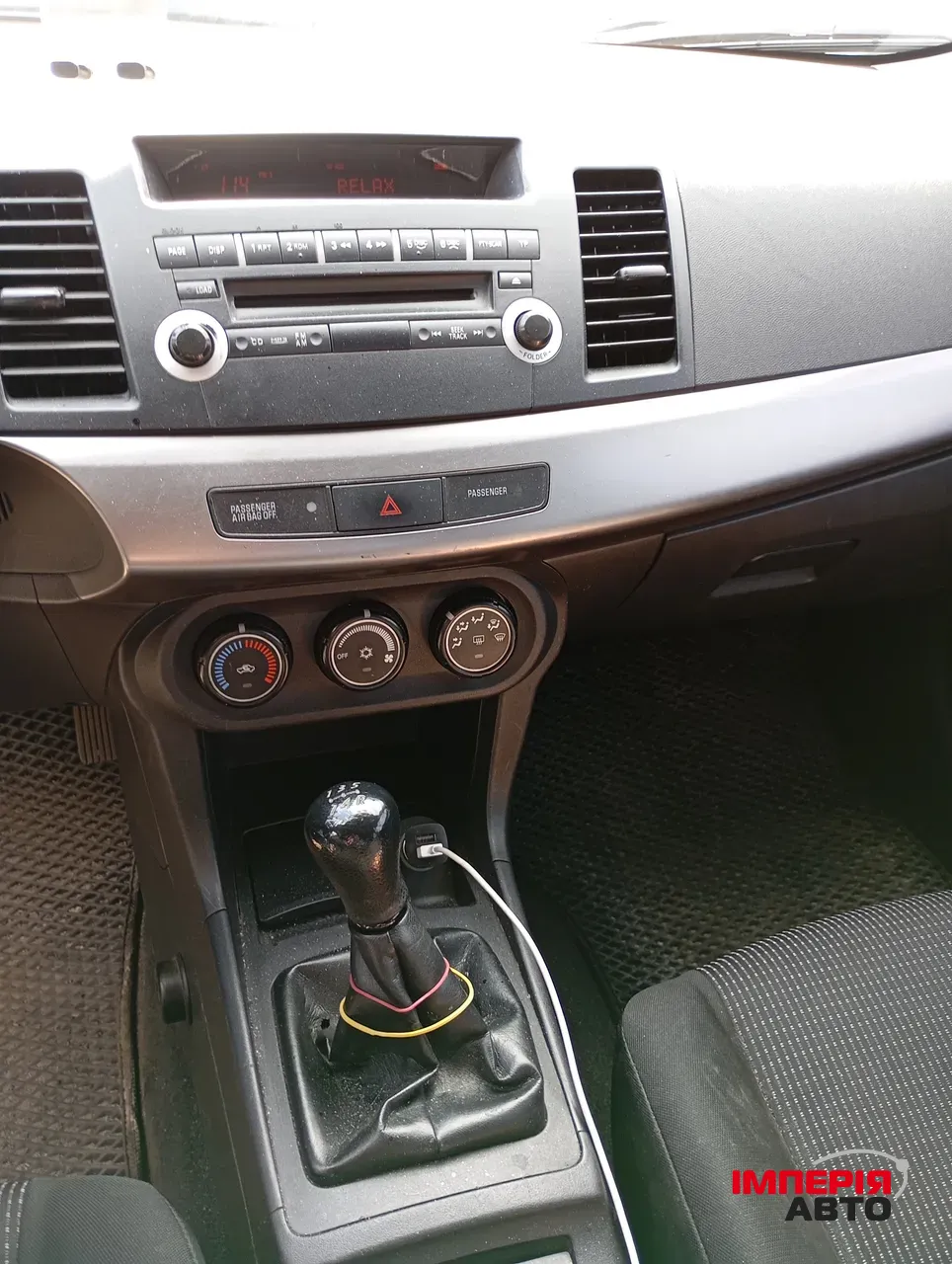 Mitsubishi Lancer - фото 8