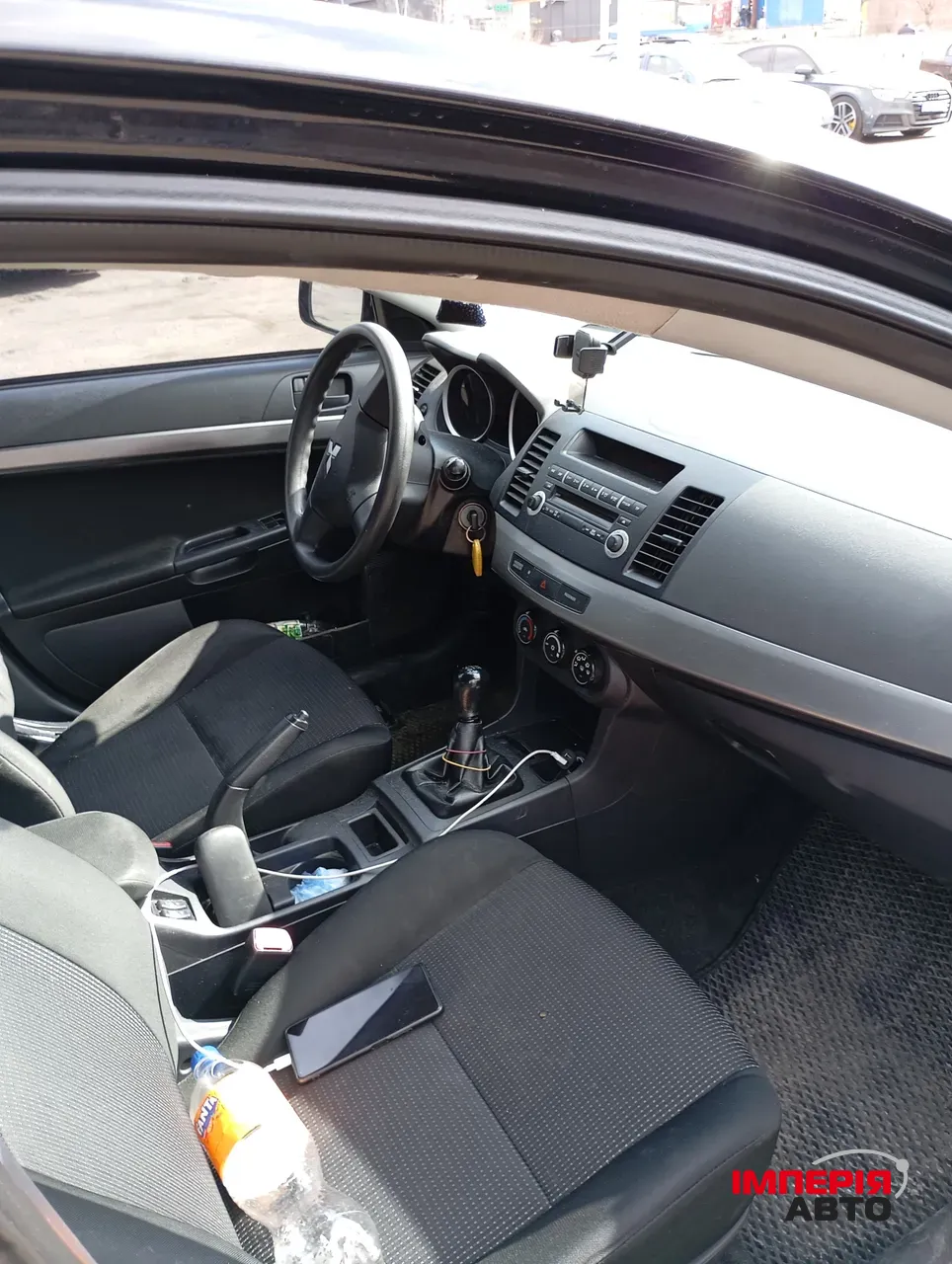 Mitsubishi Lancer - фото 9