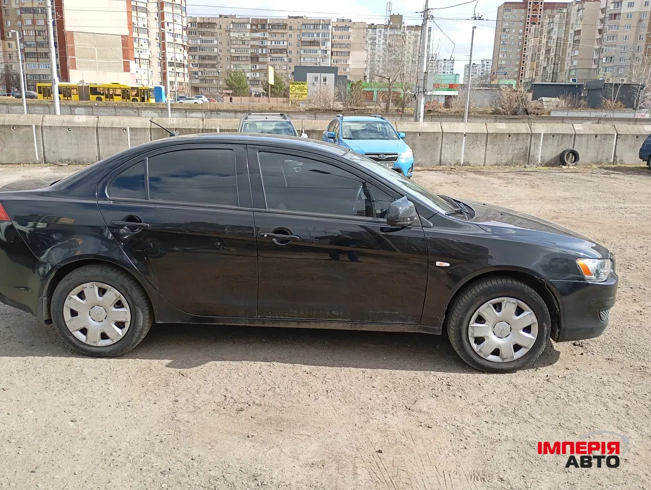 Mitsubishi Lancer - фото 4