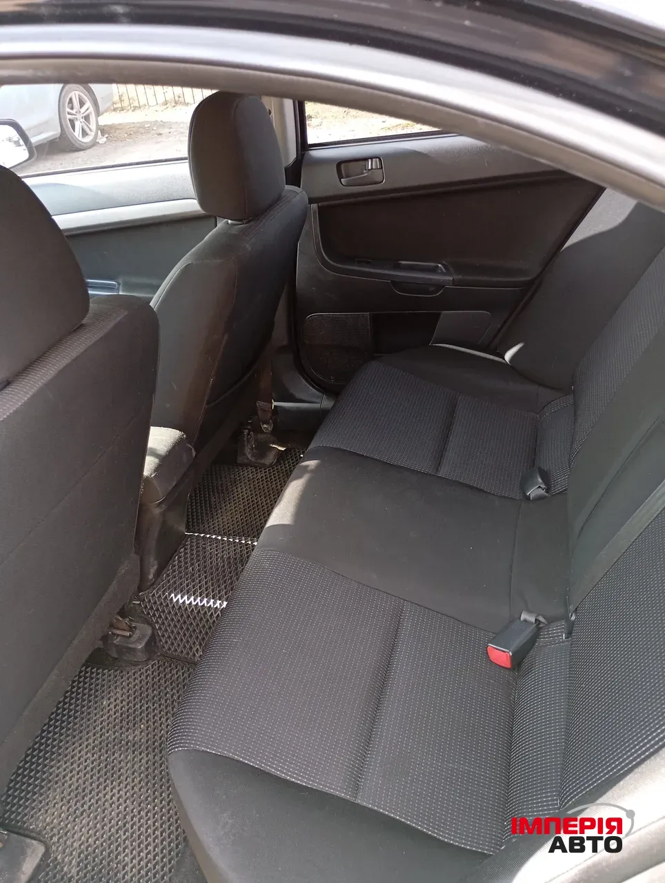 Mitsubishi Lancer - фото 6