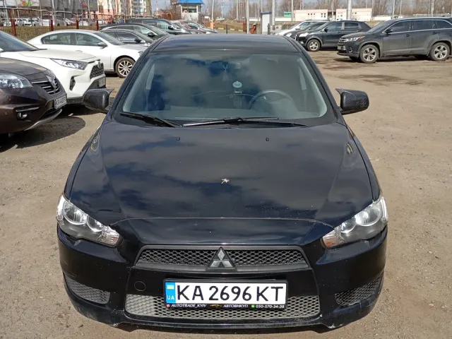 Mitsubishi Lancer - фото 1