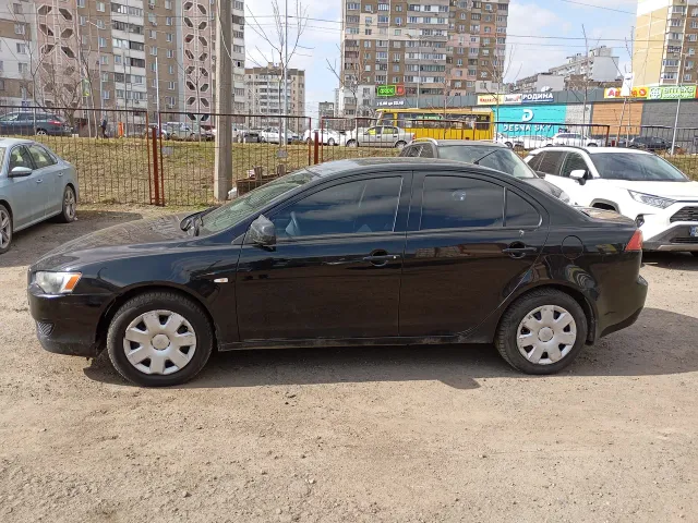 Mitsubishi Lancer - фото 3