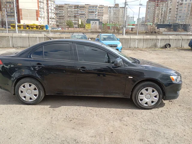 Mitsubishi Lancer - фото 4