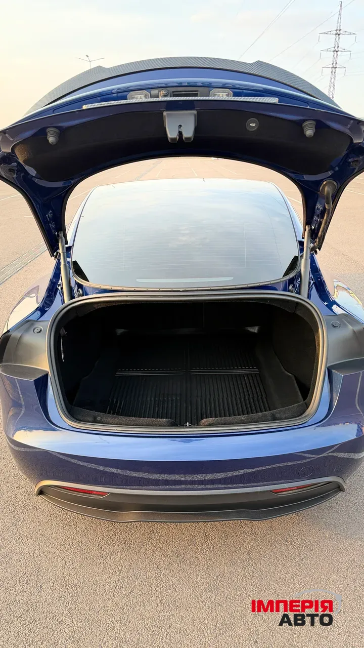 Tesla Model 3 - фото 12