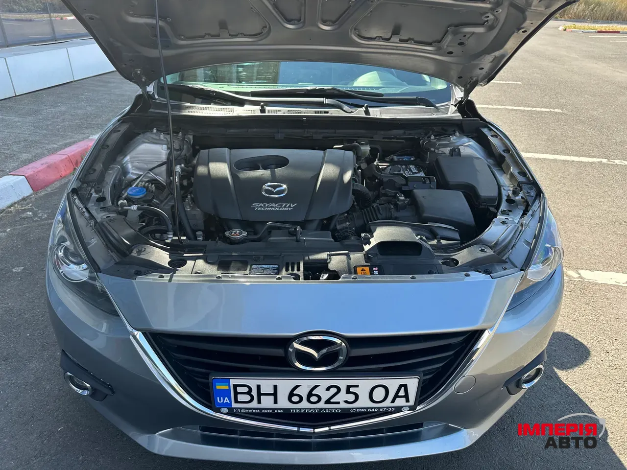 Mazda 3 - фото 10