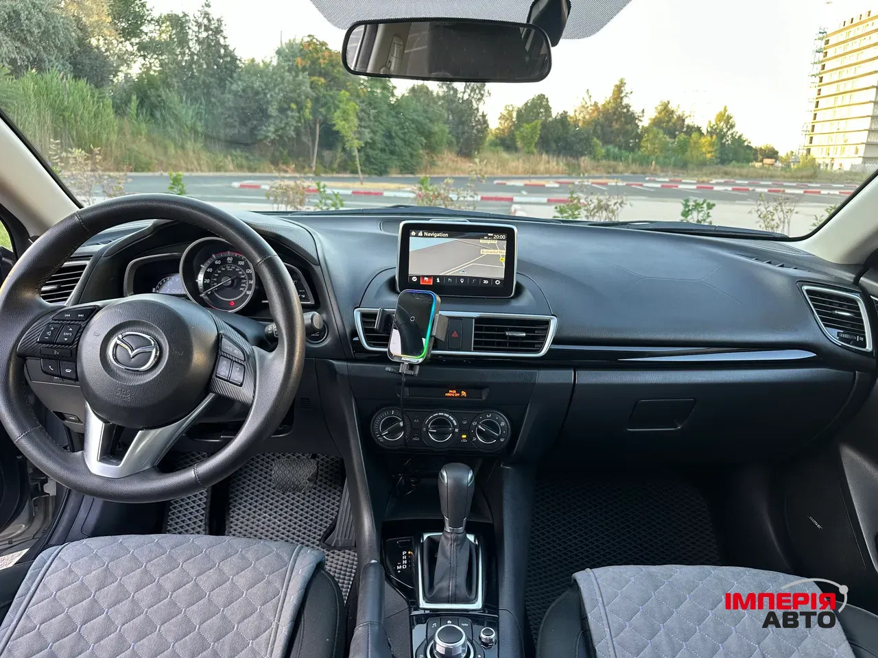Mazda 3 - фото 11