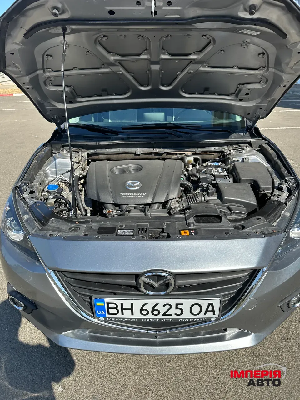 Mazda 3 - фото 8