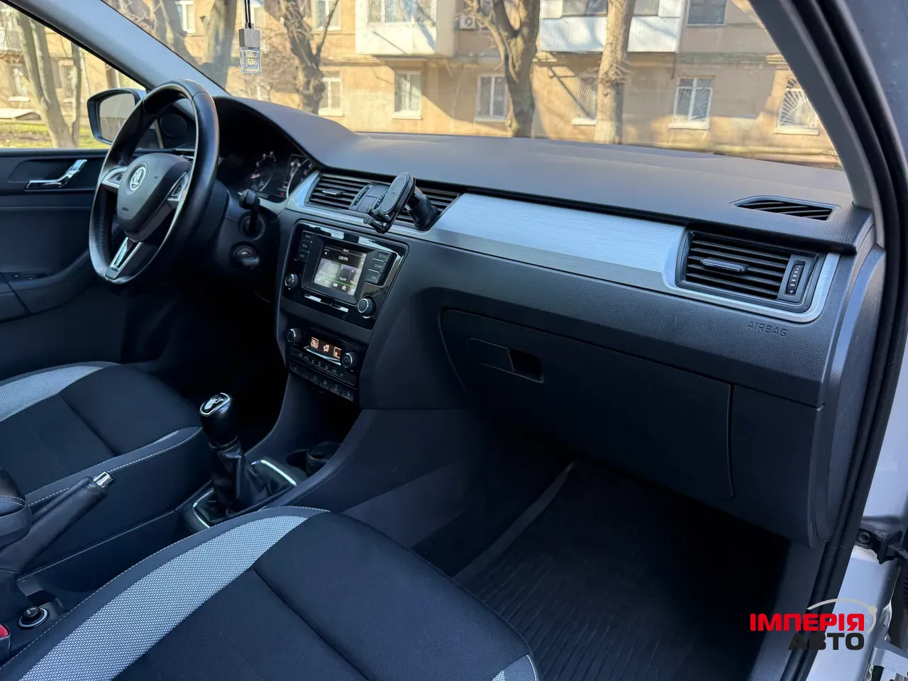 Skoda Rapid - фото 12