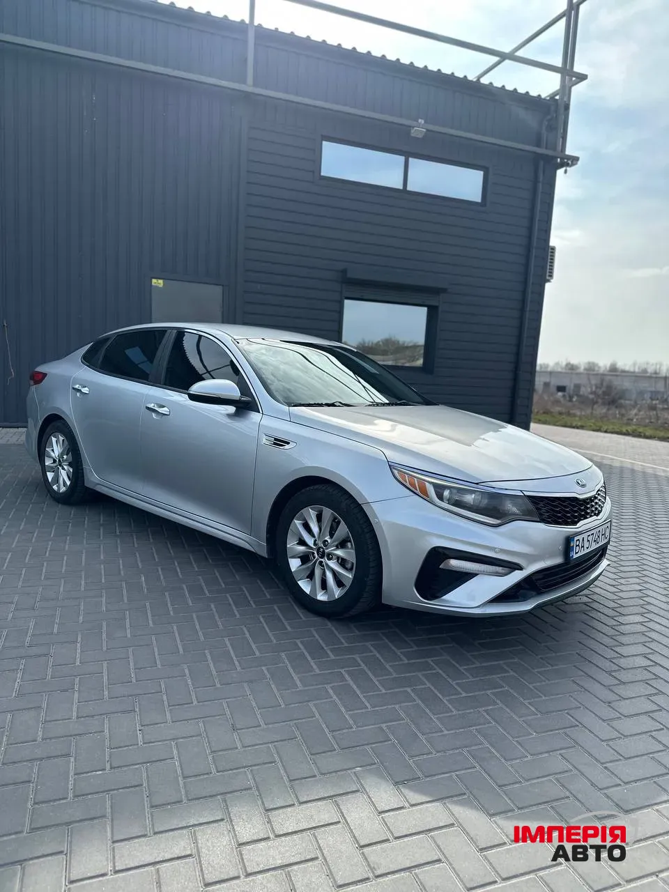 Kia Optima - фото 1