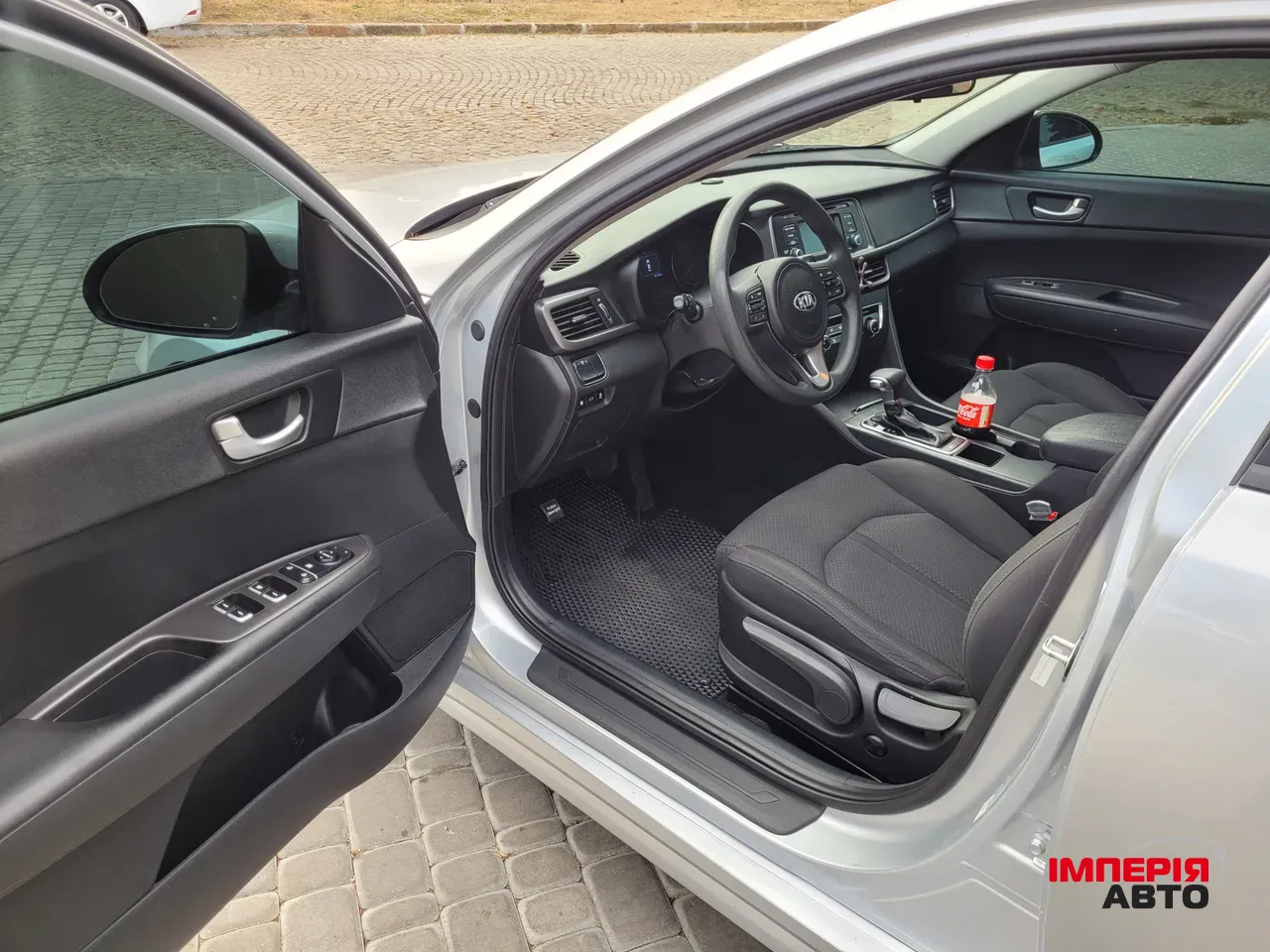 Kia Optima - фото 10