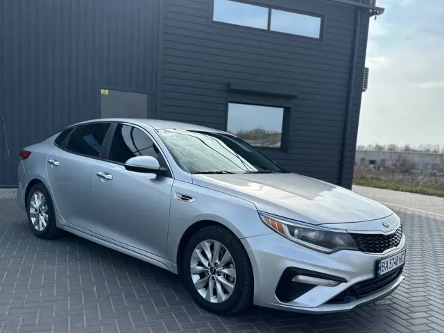 Kia Optima - фото 1