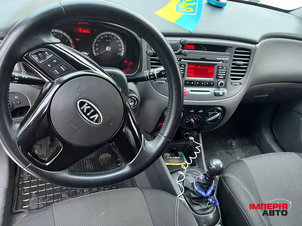 Kia Rio - фото 8