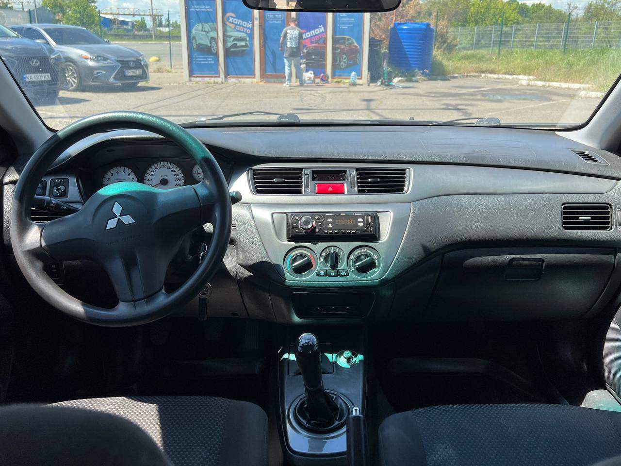 Mitsubishi Lancer - фото 14