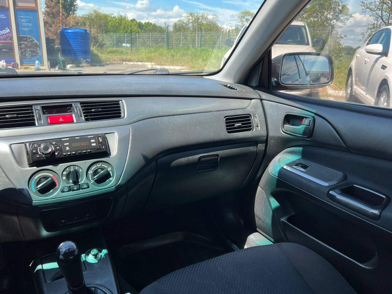 Mitsubishi Lancer - фото 17