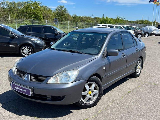 Mitsubishi Lancer - фото 1