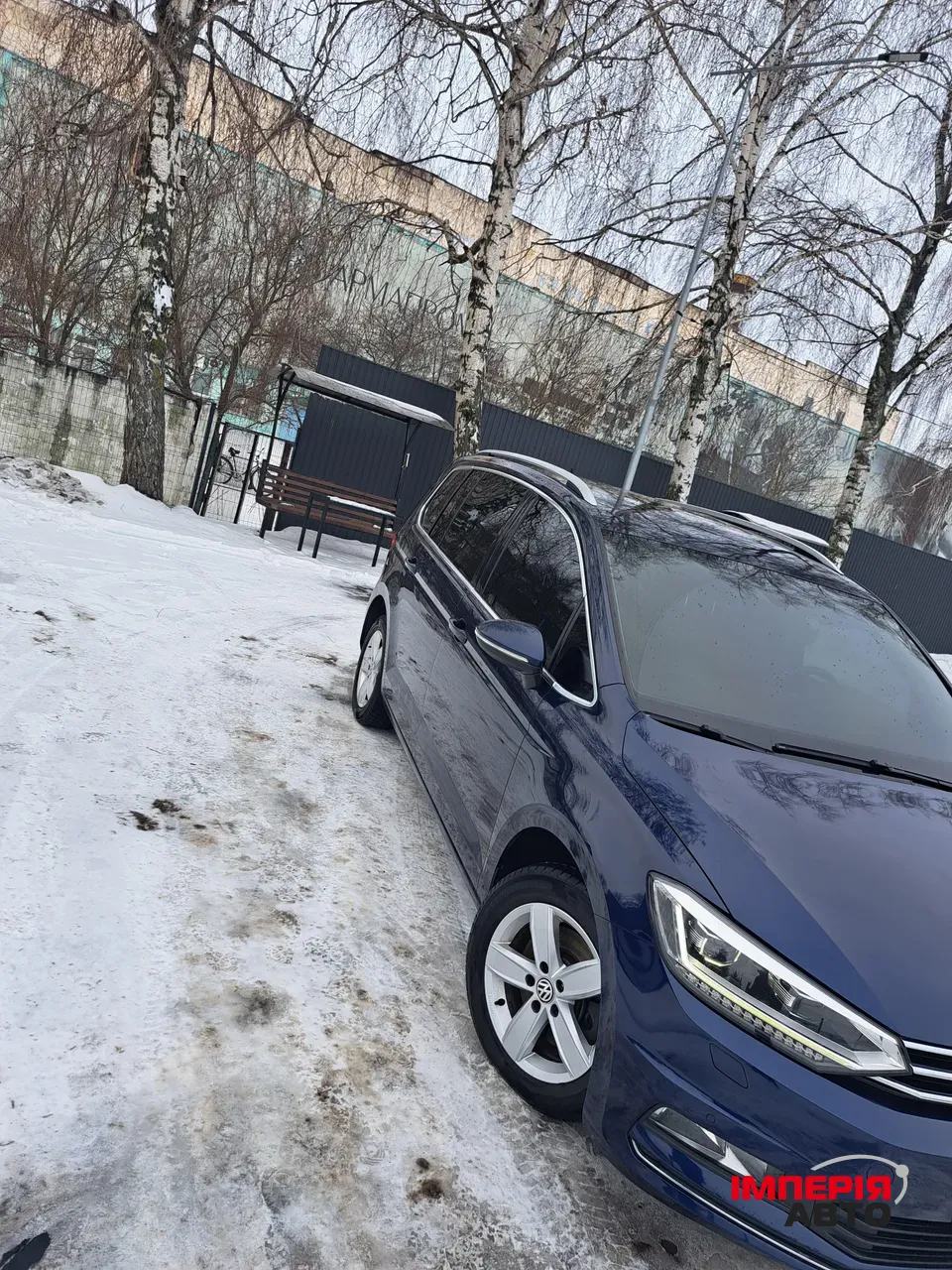 Volkswagen Touran - фото 1