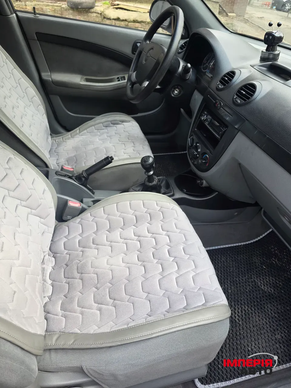 Chevrolet Lacetti - фото 12