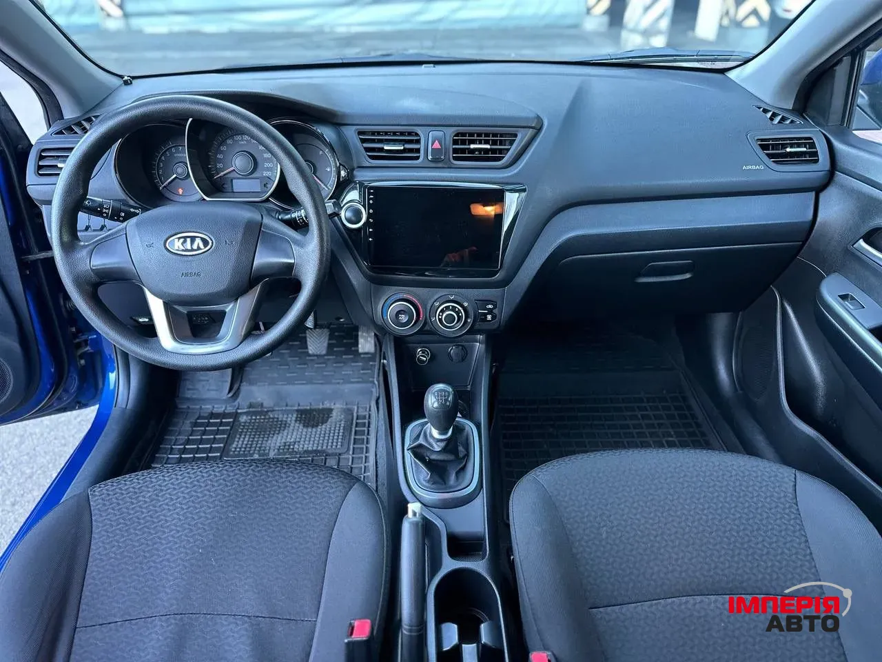 Kia Rio - фото 7