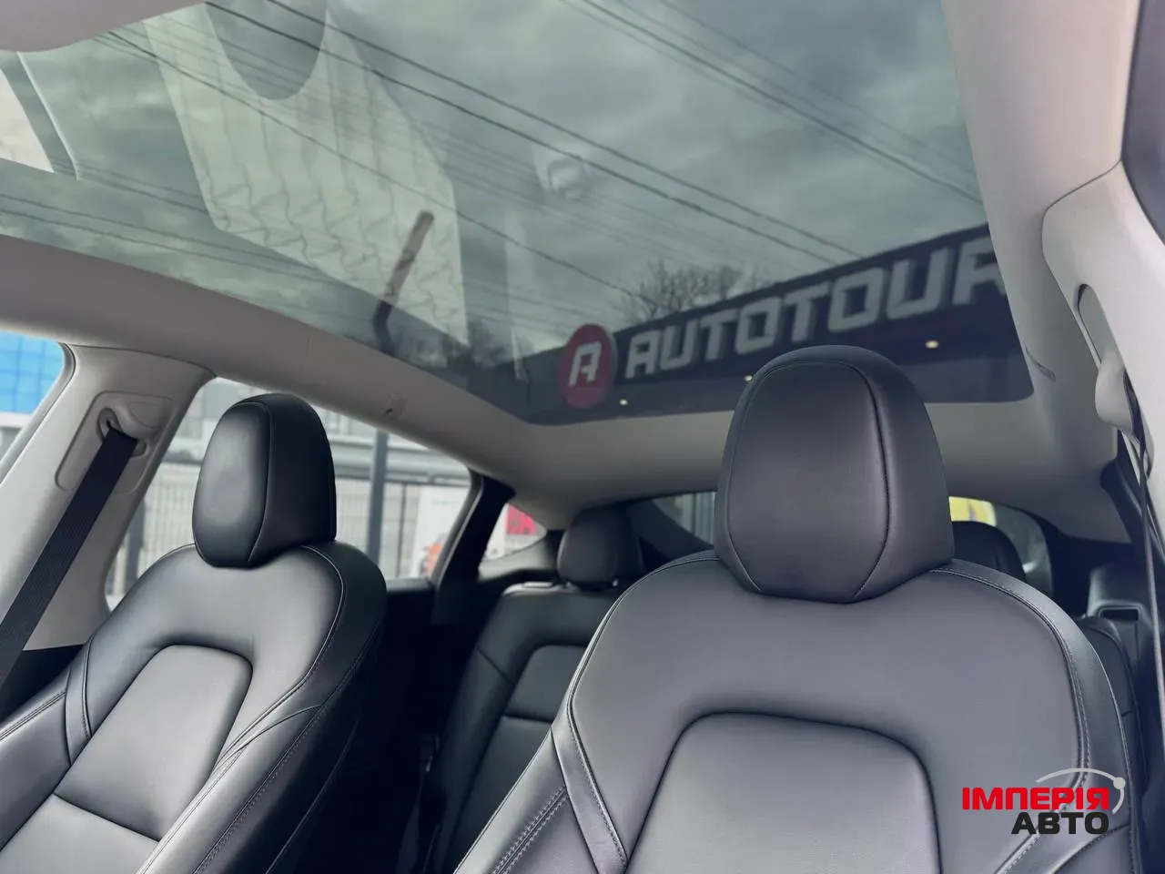 Tesla Model Y - фото 7