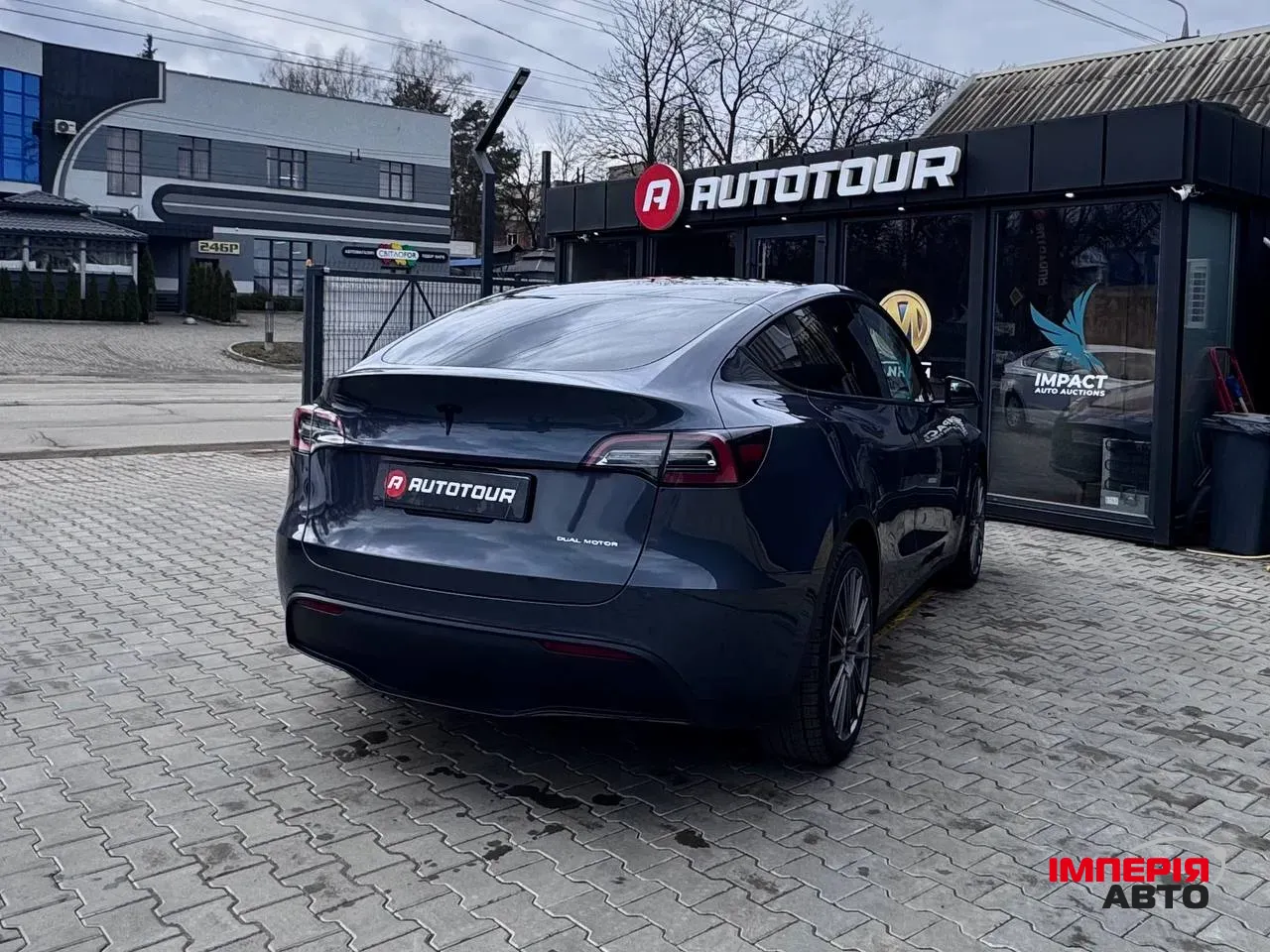 Tesla Model Y - фото 11