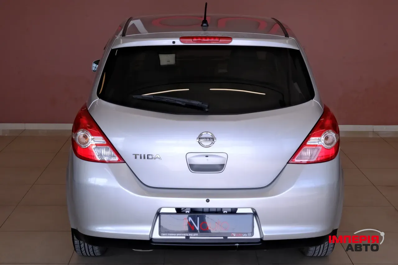 Nissan Tiida - фото 6