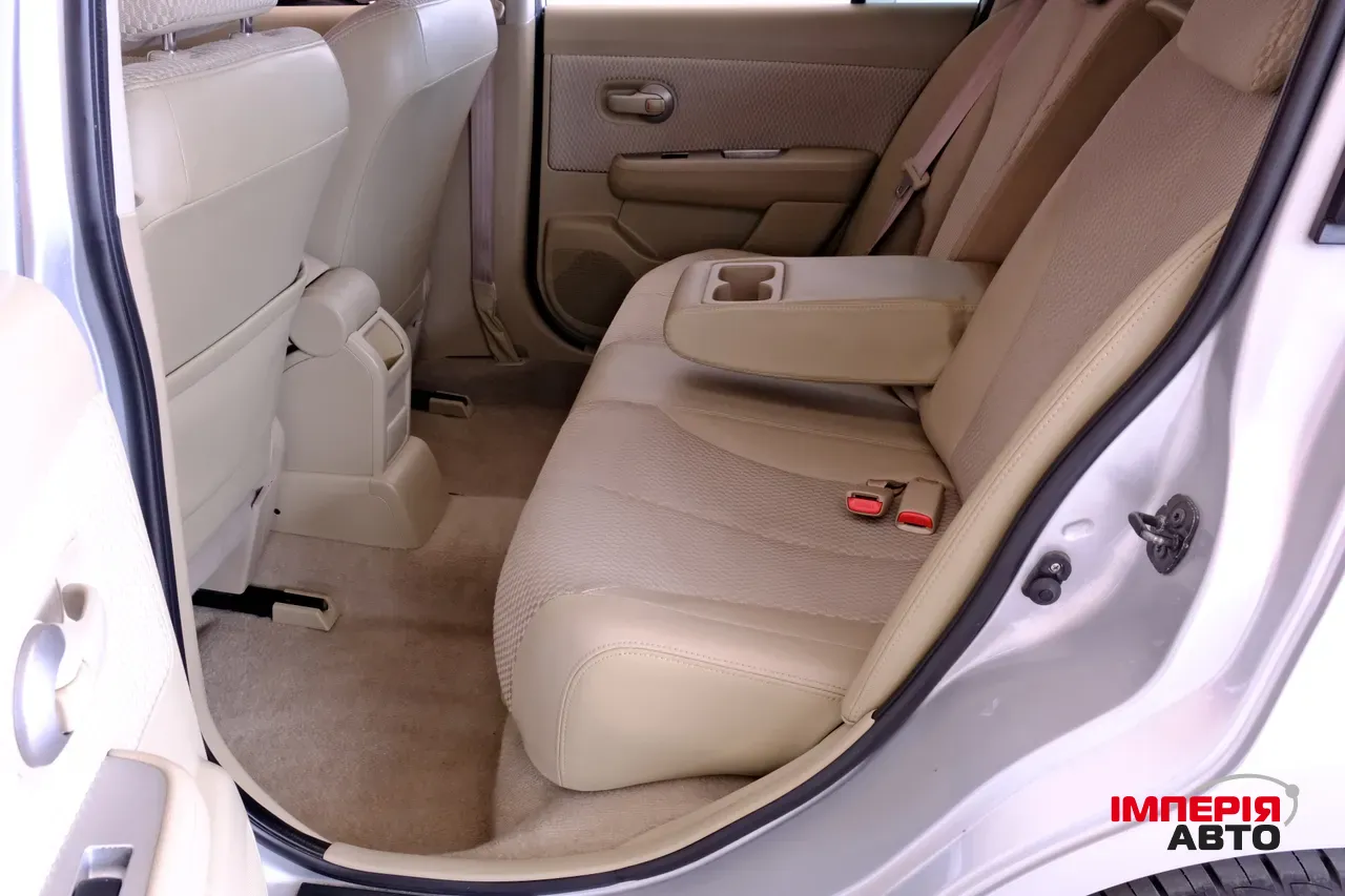 Nissan Tiida - фото 8