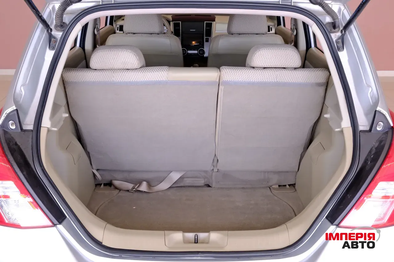 Nissan Tiida - фото 9