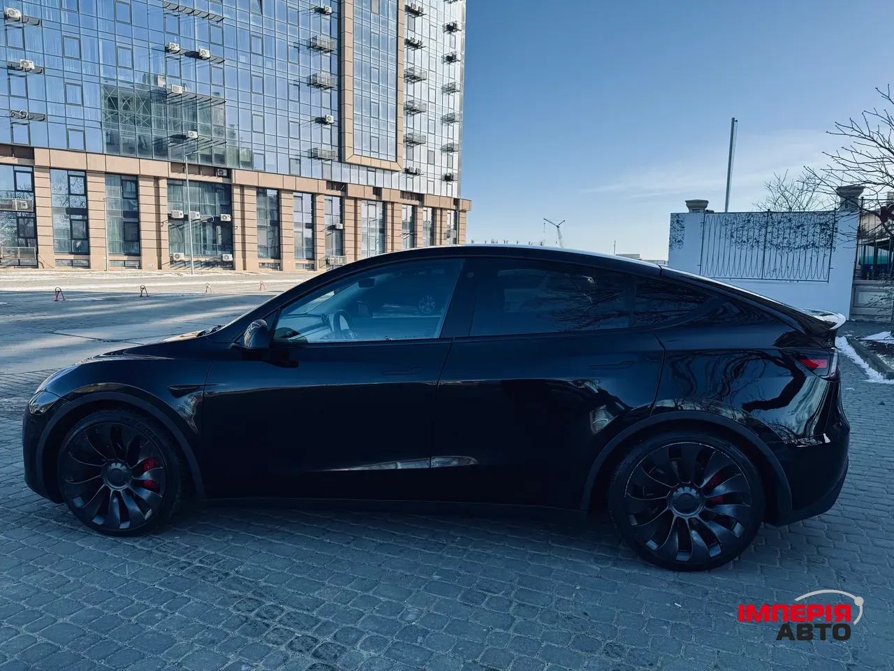 Tesla Model Y - фото 11