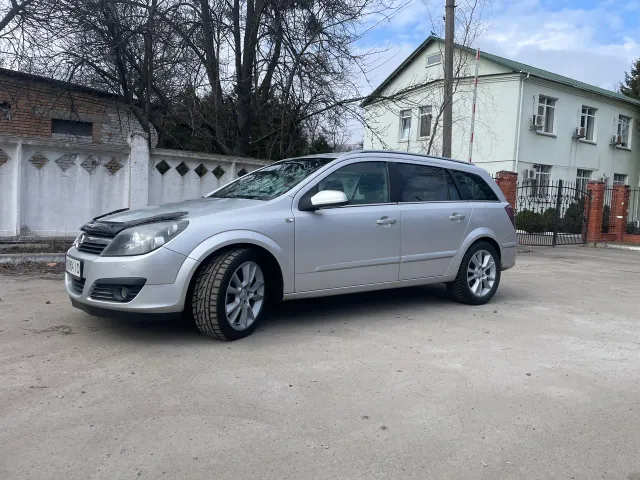 Opel Astra - фото 1