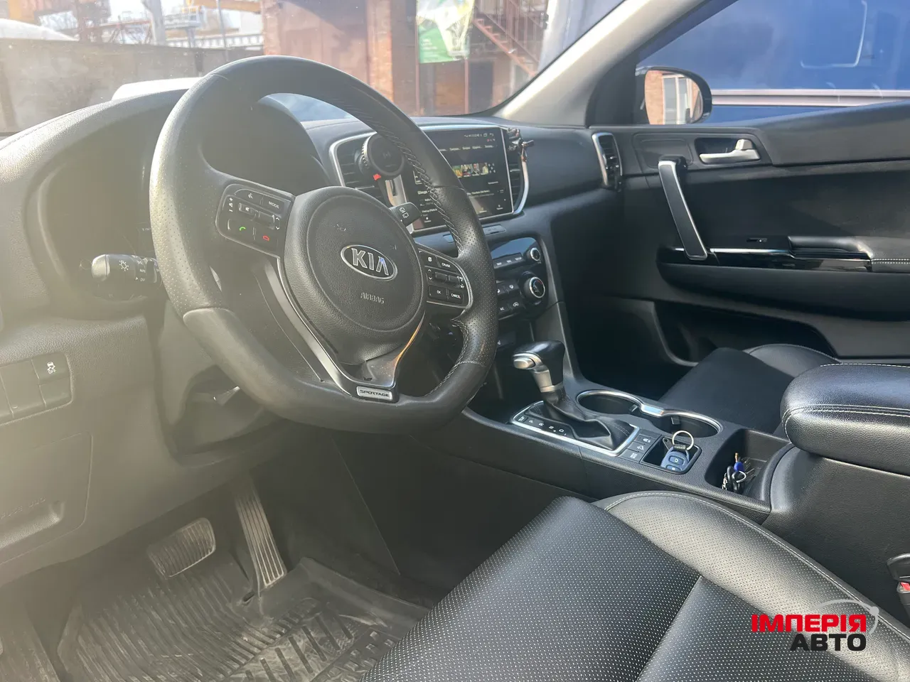 Kia Sportage - фото 9