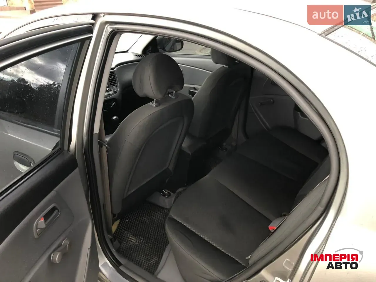 Kia Rio - фото 5