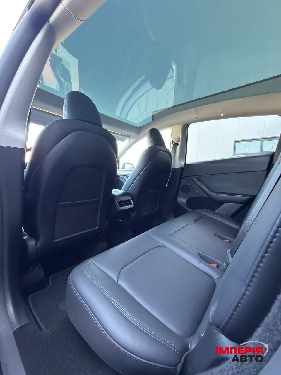 Tesla Model Y - фото 16