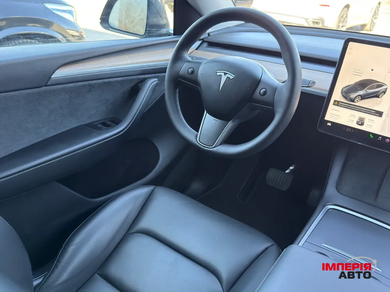 Tesla Model Y - фото 11