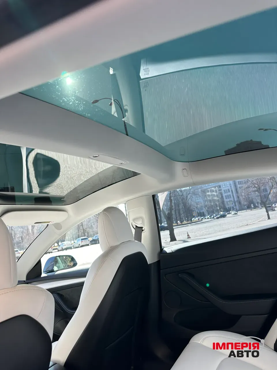 Tesla Model 3 - фото 11