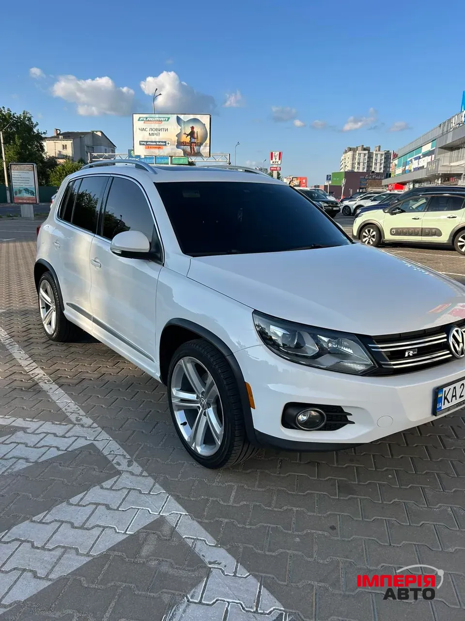 Volkswagen Tiguan - фото 1