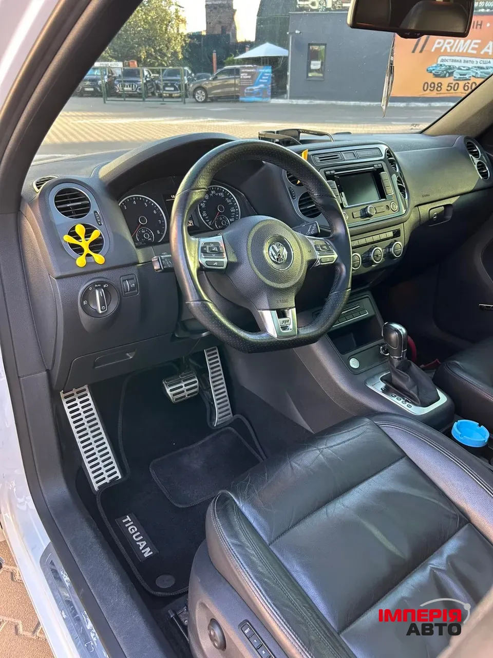 Volkswagen Tiguan - фото 12