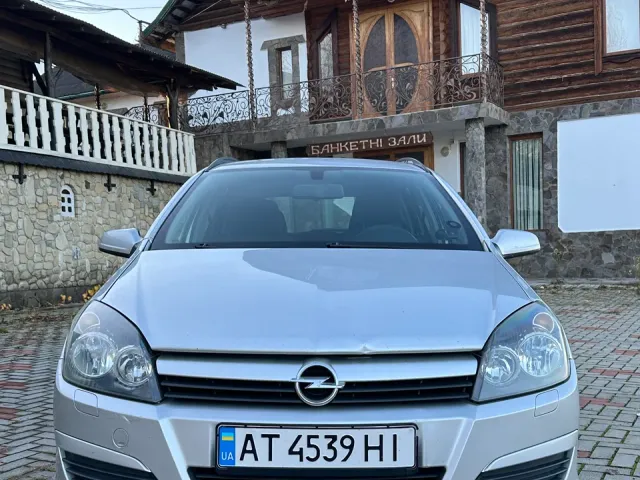 Opel Astra - фото 1