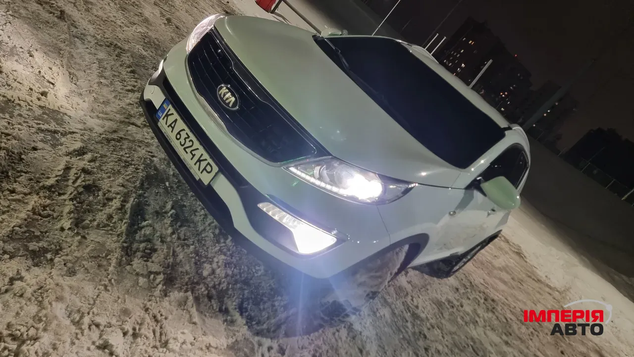 Kia Sportage - фото 1