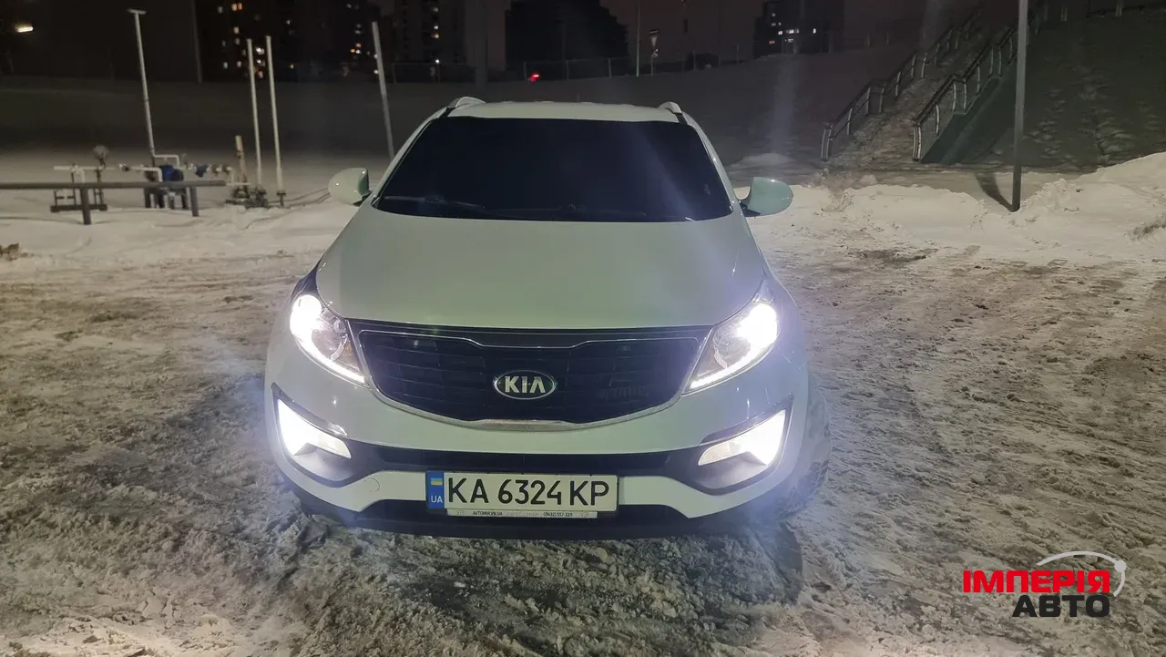 Kia Sportage - фото 12