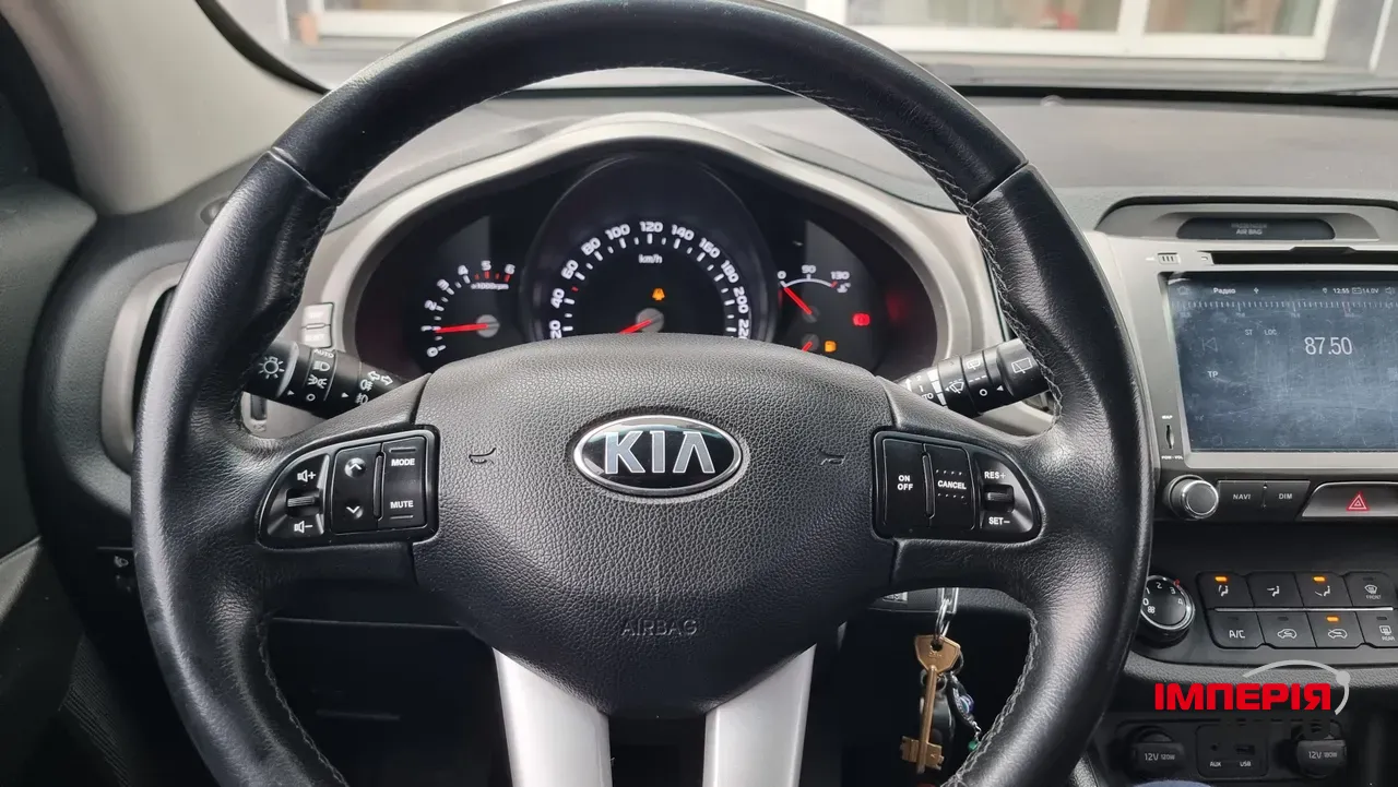 Kia Sportage - фото 11