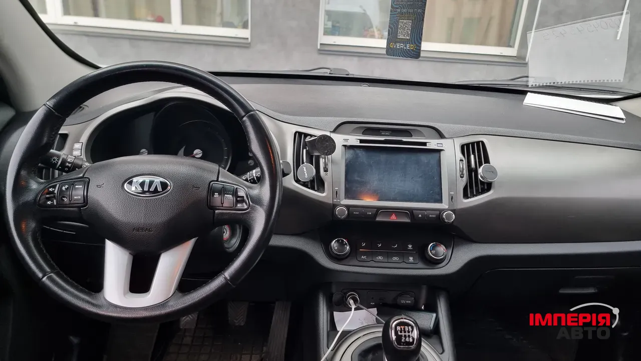 Kia Sportage - фото 7