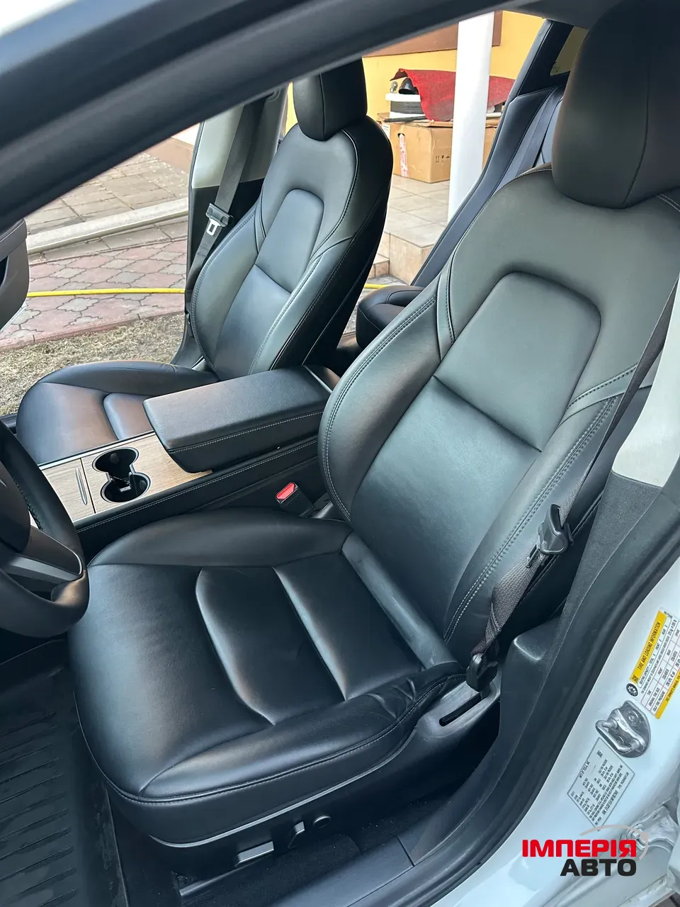 Tesla Model 3 - фото 11