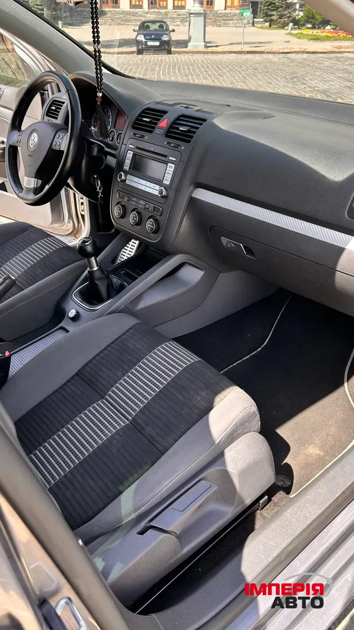 Volkswagen Golf - фото 10